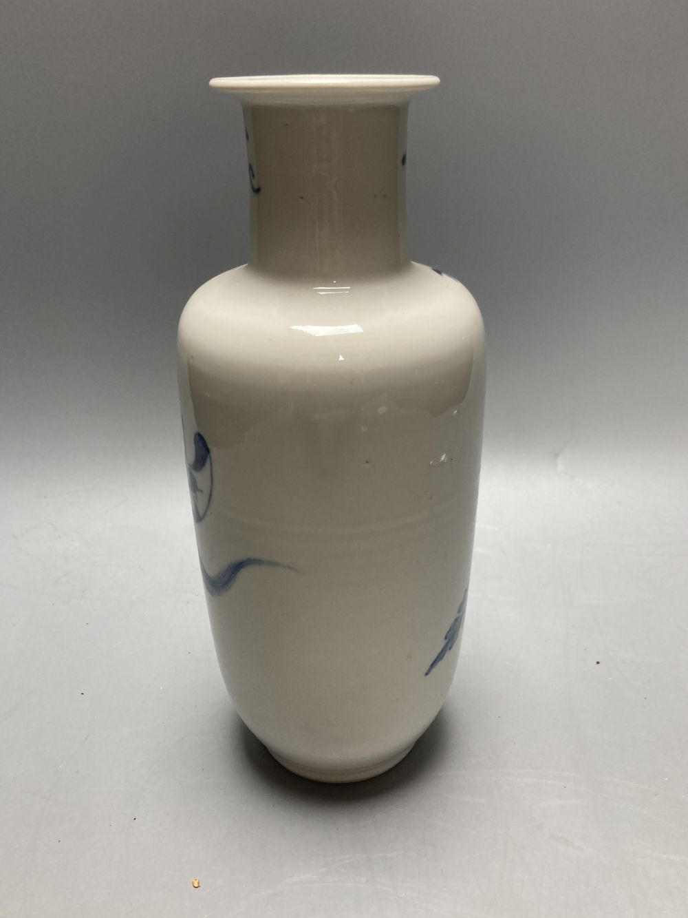 A late 19th century Chinese blue and white rouleau vase, height 25cm